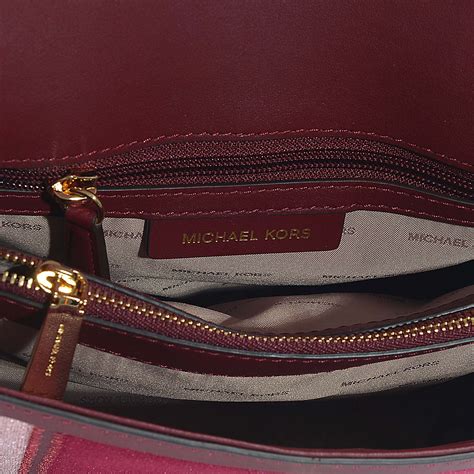 michael kors est 1981 burgundy bag|Michael Kors maroon bag.